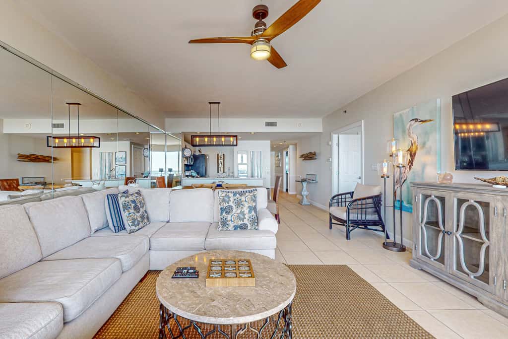 7th floor condo with ocean views, shared pool, central AC, and washer&dryer