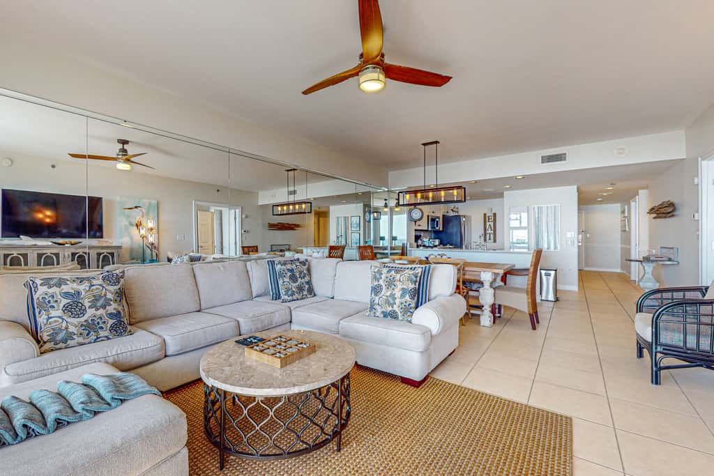 7th floor condo with ocean views, shared pool, central AC, and washer&dryer