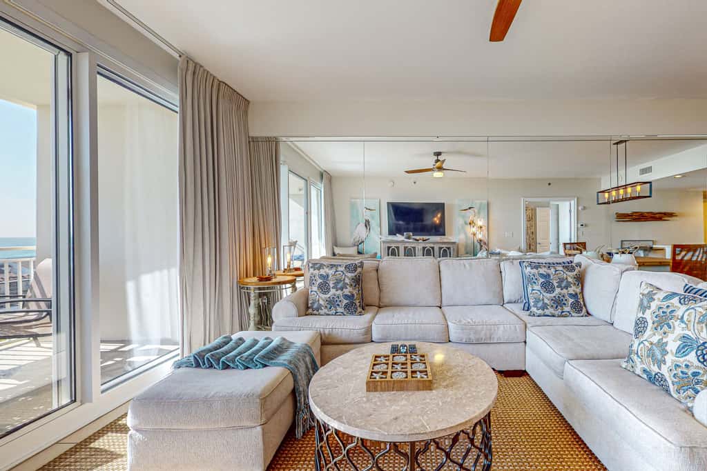 7th floor condo with ocean views, shared pool, central AC, and washer&dryer