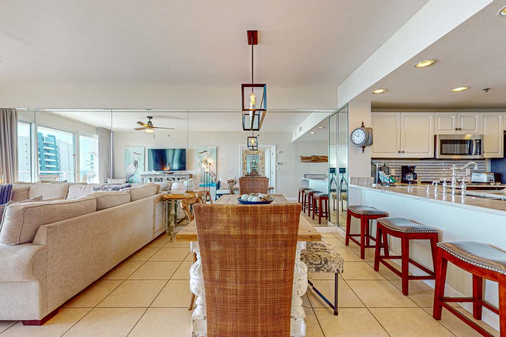 7th floor condo with ocean views, shared pool, central AC, and washer&dryer