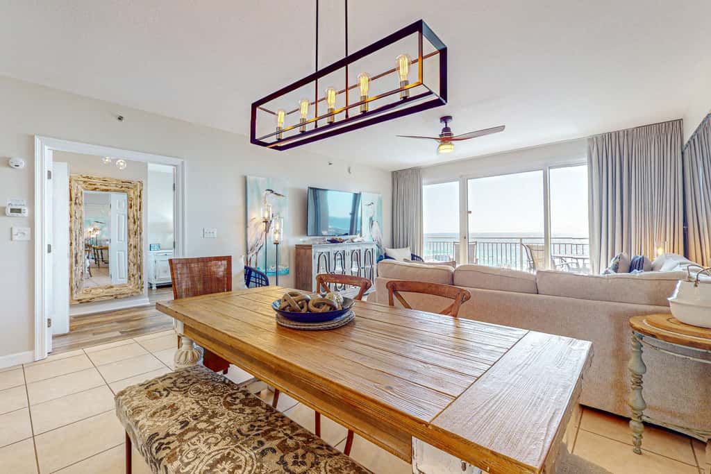 7th floor condo with ocean views, shared pool, central AC, and washer&dryer