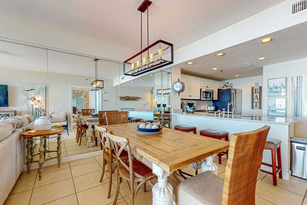 7th floor condo with ocean views, shared pool, central AC, and washer&dryer
