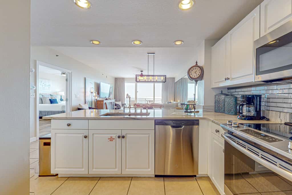7th floor condo with ocean views, shared pool, central AC, and washer&dryer