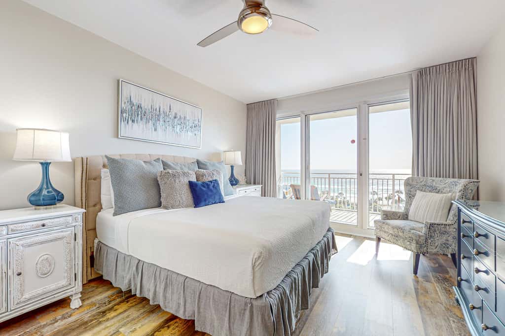 7th floor condo with ocean views, shared pool, central AC, and washer&dryer