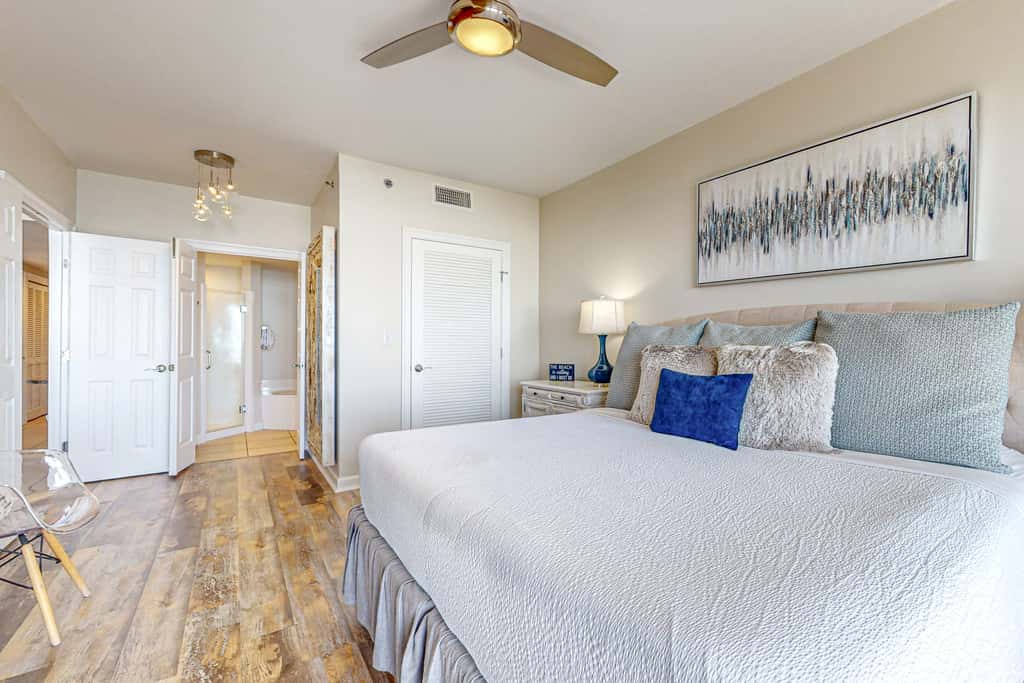 7th floor condo with ocean views, shared pool, central AC, and washer&dryer