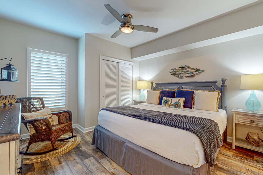 7th floor condo with ocean views, shared pool, central AC, and washer&dryer