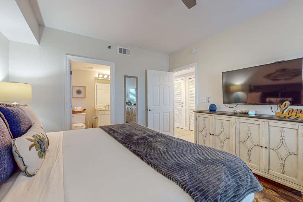 7th floor condo with ocean views, shared pool, central AC, and washer&dryer