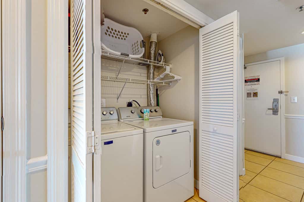 7th floor condo with ocean views, shared pool, central AC, and washer&dryer