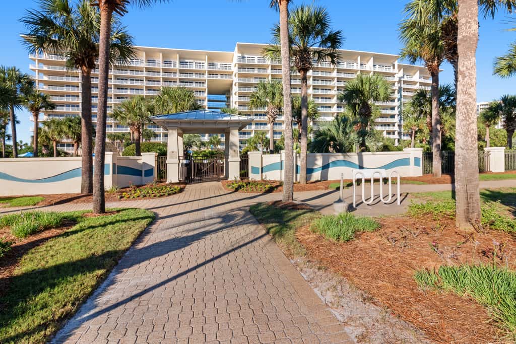 7th floor condo with ocean views, shared pool, central AC, and washer&dryer