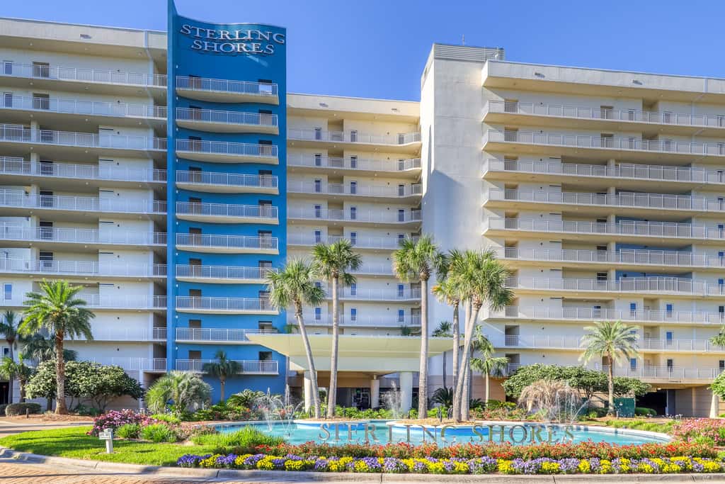 7th floor condo with ocean views, shared pool, central AC, and washer&dryer