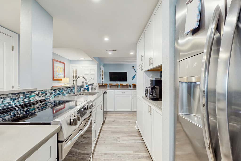 Second-Floor Ocean & Gulf Front Condo w Free WiFi, 2 Balconies, Shared Pool, AC