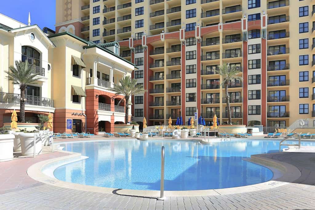 Gulf-view condo with balcony, W/D, AC, pools, hot tubs & gym