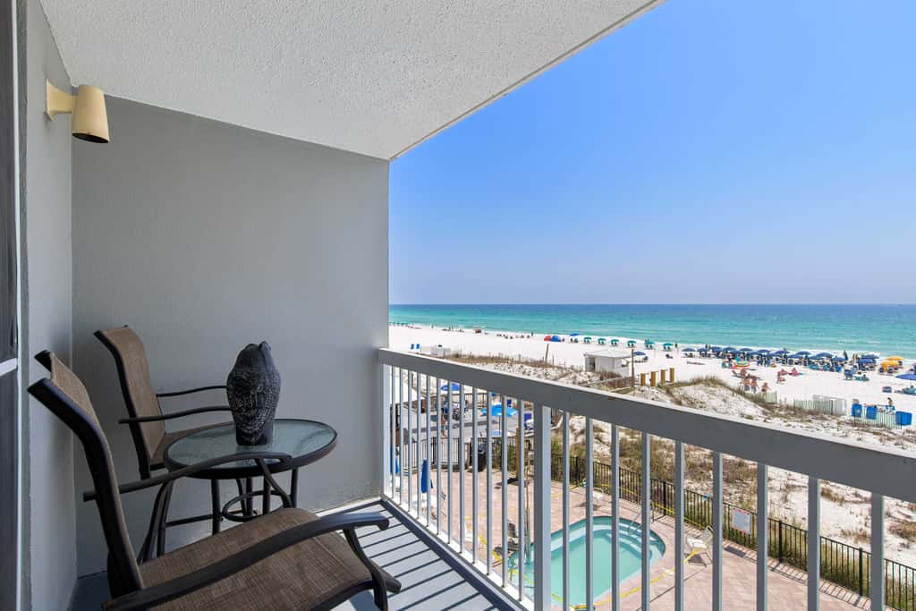 Gulf-front condo with balcony, beach access, pool & hot tub