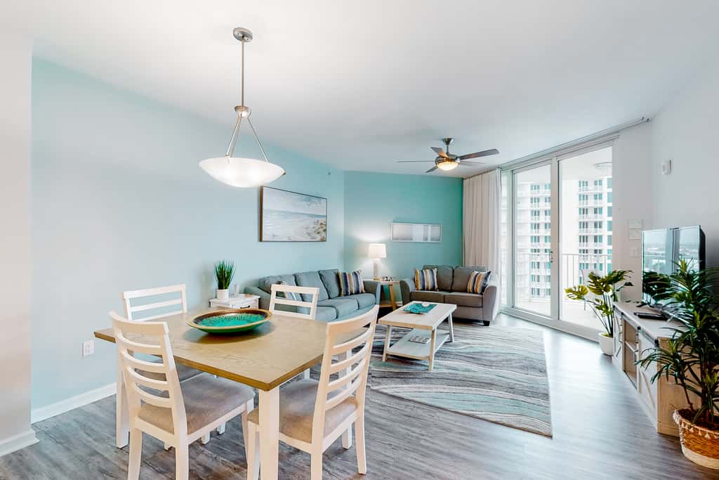 Beachy resort condo with balcony, outdoor pools, hot tub, gym, tennis, AC, & W&D
