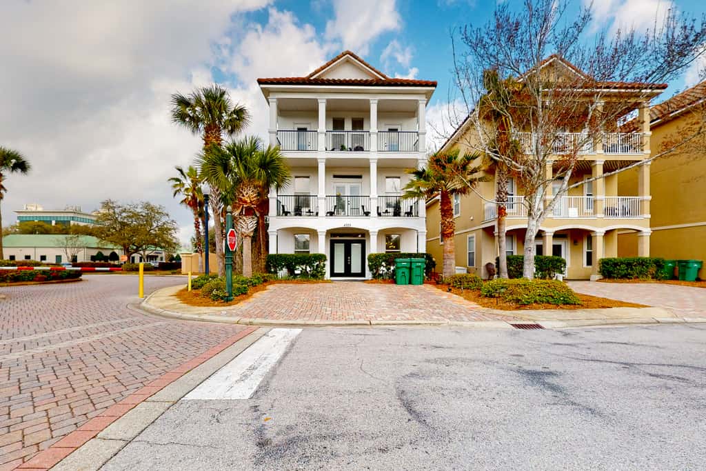 Dog-friendly home near beach with pool access, two balconies, wet bar, & WD