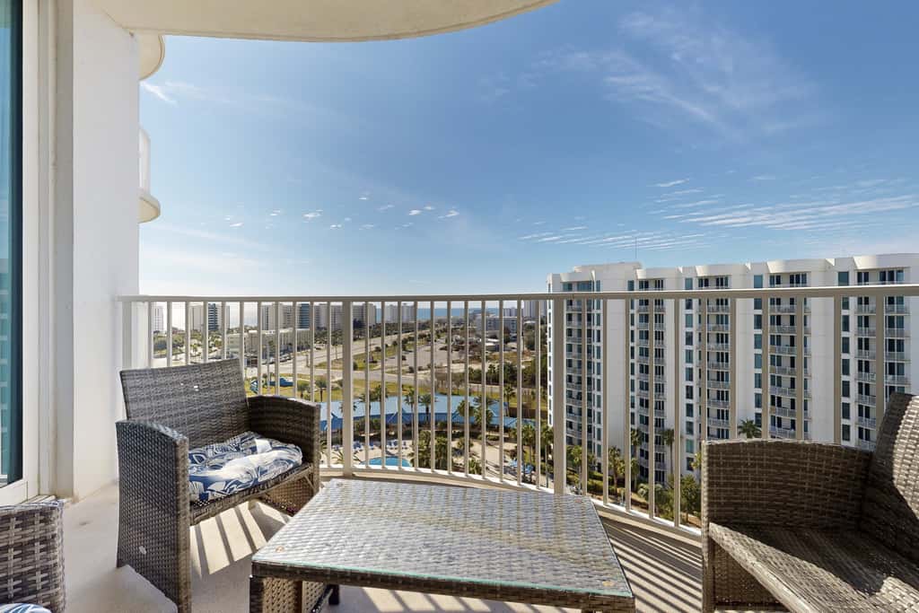 Water-view 11th-floor condo with hot tub, heated pool, tennis, sauna, gym, W/D