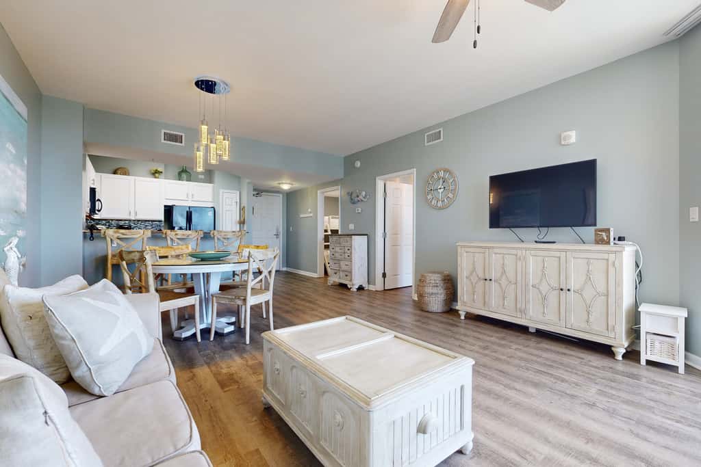 Water-view 11th-floor condo with hot tub, heated pool, tennis, sauna, gym, W/D