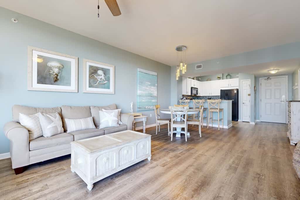 Water-view 11th-floor condo with hot tub, heated pool, tennis, sauna, gym, W/D