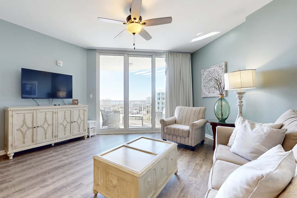 Water-view 11th-floor condo with hot tub, heated pool, tennis, sauna, gym, W/D