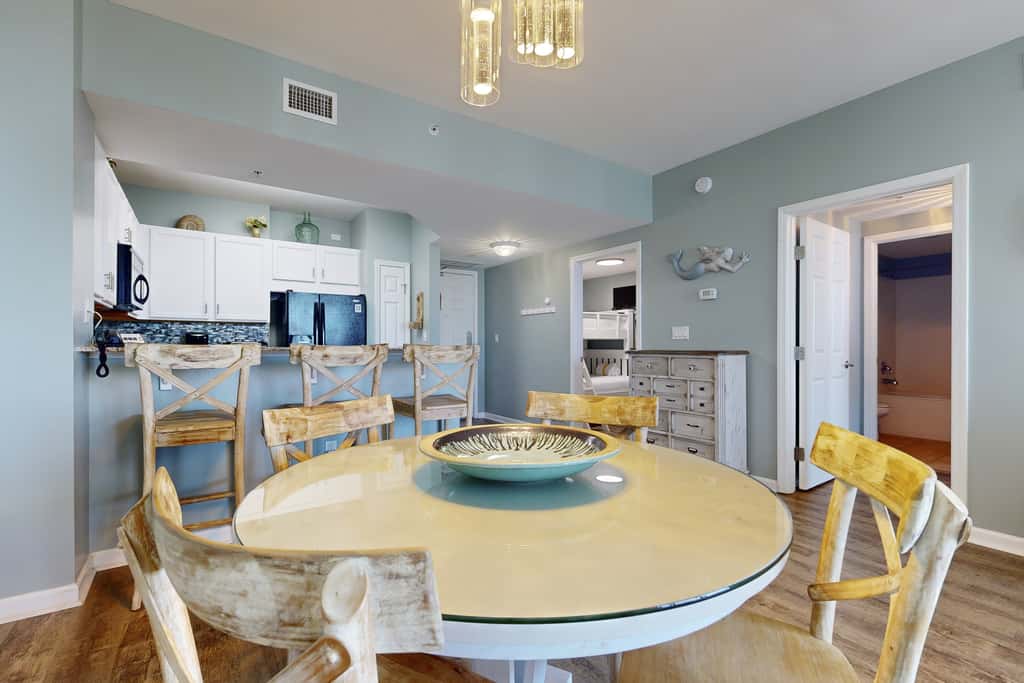 Water-view 11th-floor condo with hot tub, heated pool, tennis, sauna, gym, W/D