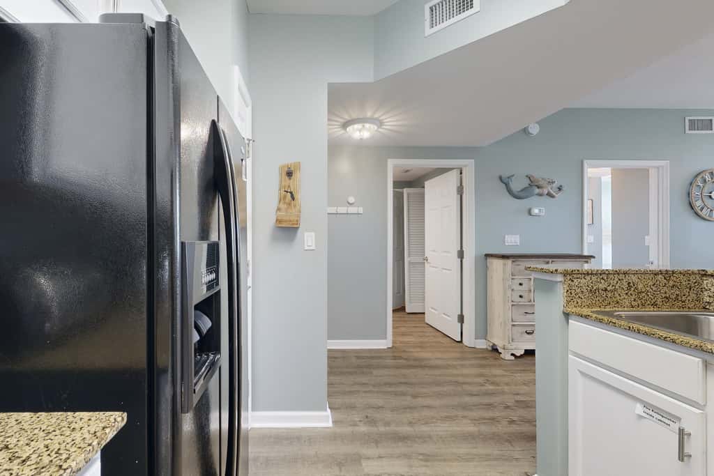 Water-view 11th-floor condo with hot tub, heated pool, tennis, sauna, gym, W/D