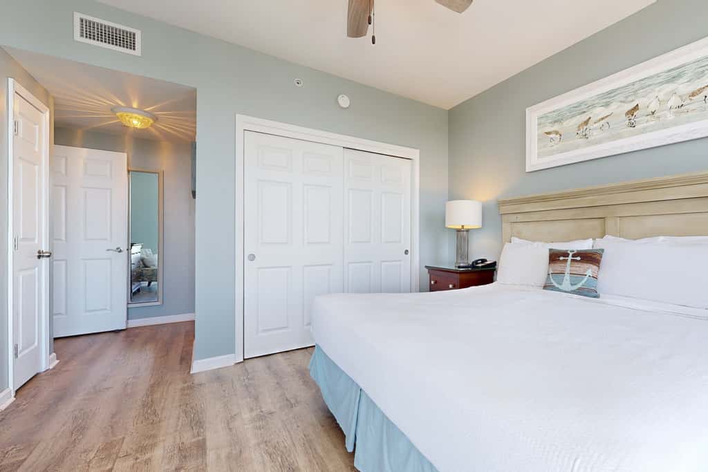 Water-view 11th-floor condo with hot tub, heated pool, tennis, sauna, gym, W/D