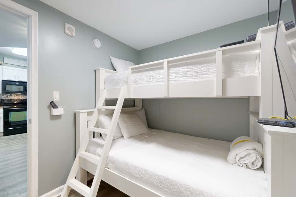 Water-view 11th-floor condo with hot tub, heated pool, tennis, sauna, gym, W/D