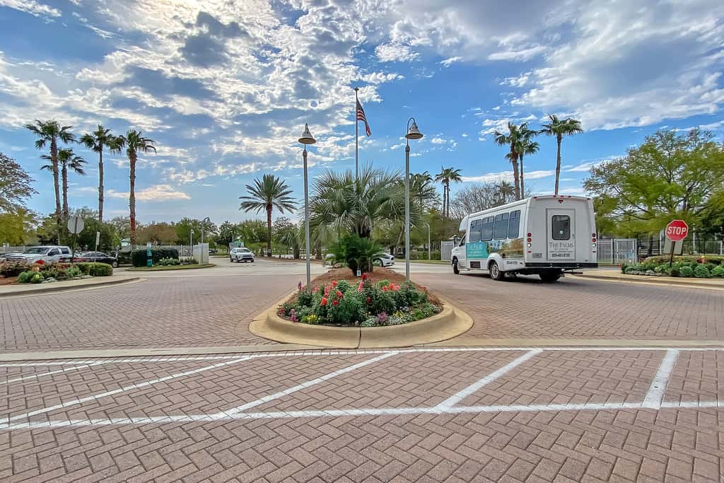 Water-view 11th-floor condo with hot tub, heated pool, tennis, sauna, gym, W/D