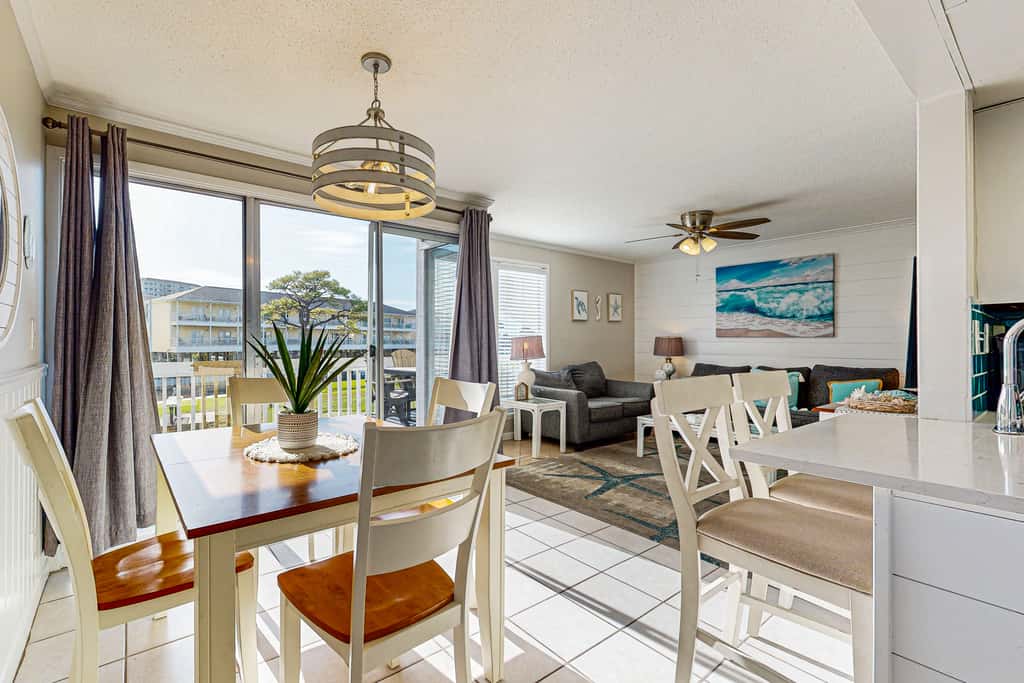 Inviting condo with dock, pool, hot tub & private beach - dog-friendly