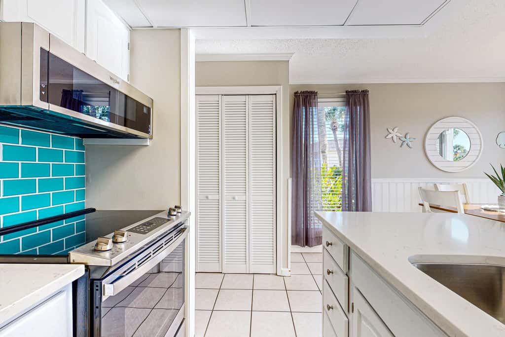 Inviting condo with dock, pool, hot tub & private beach - dog-friendly
