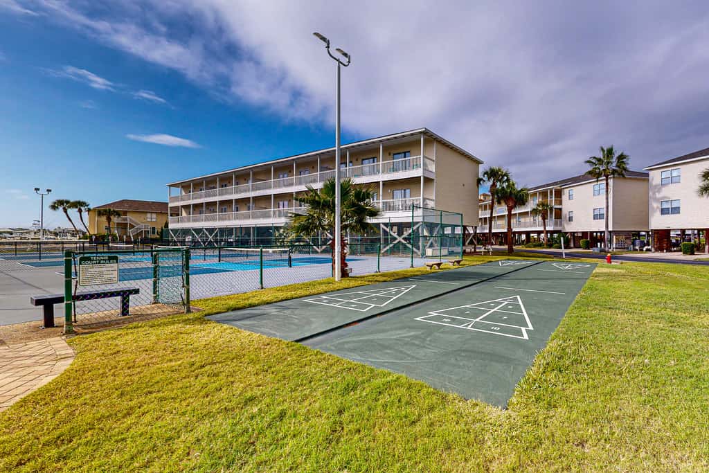 Inviting condo with dock, pool, hot tub & private beach - dog-friendly