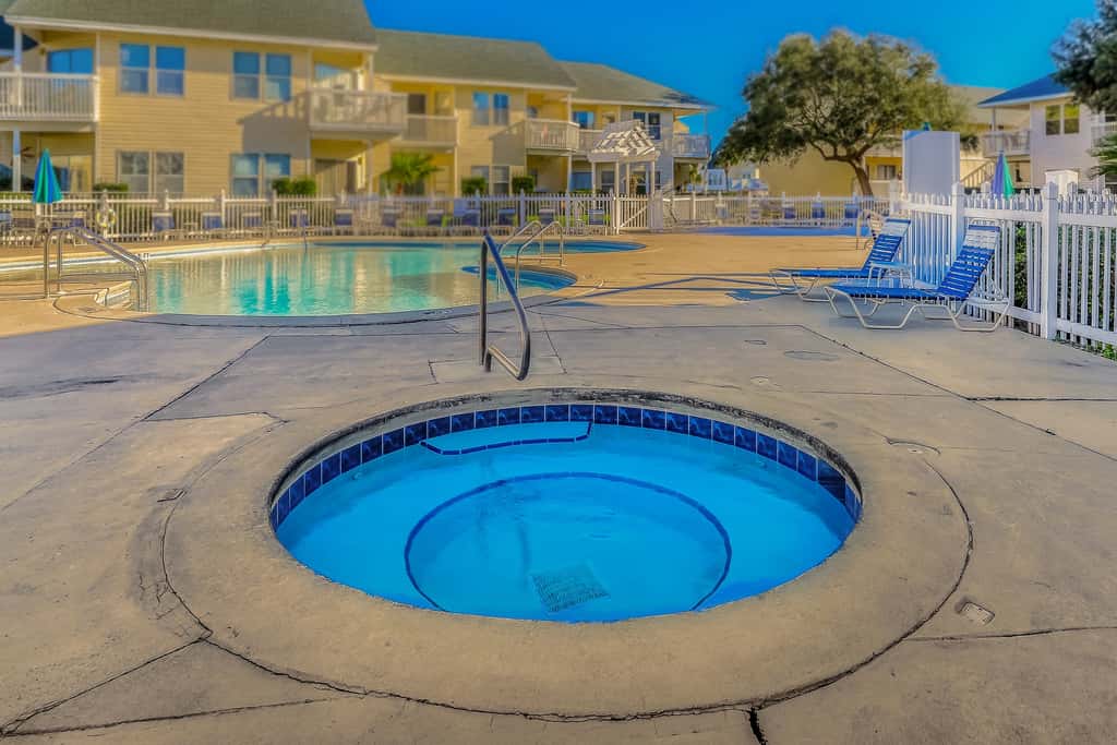 Inviting condo with dock, pool, hot tub & private beach - dog-friendly