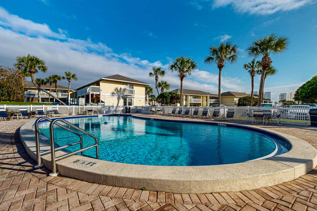 Inviting condo with dock, pool, hot tub & private beach - dog-friendly