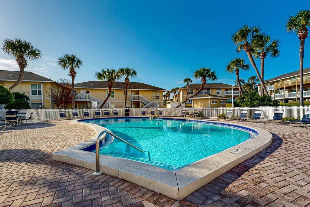 Inviting condo with dock, pool, hot tub & private beach - dog-friendly