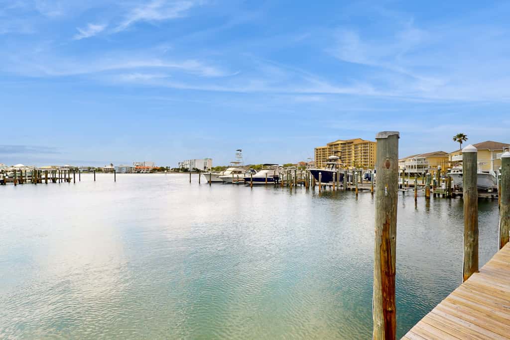 Inviting condo with dock, pool, hot tub & private beach - dog-friendly
