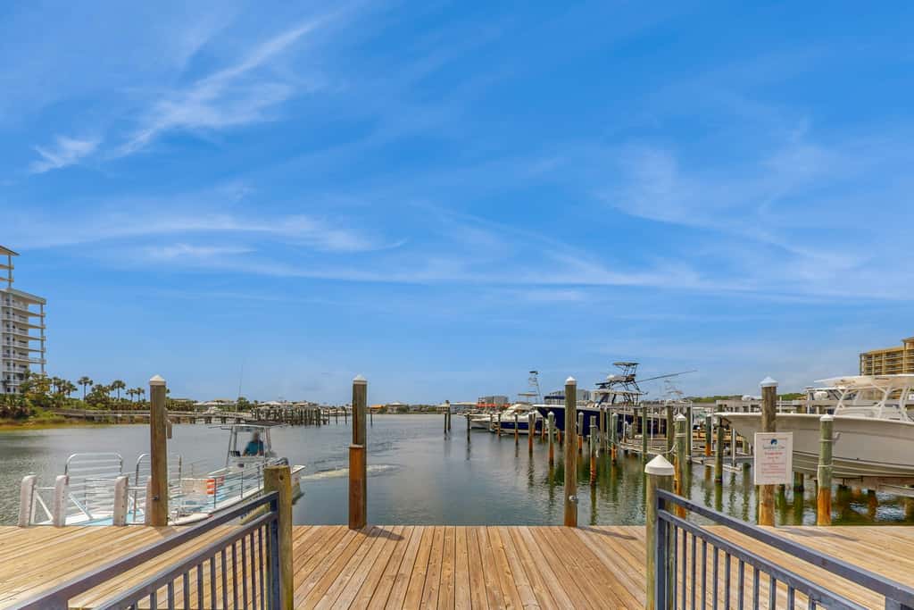 Inviting condo with dock, pool, hot tub & private beach - dog-friendly