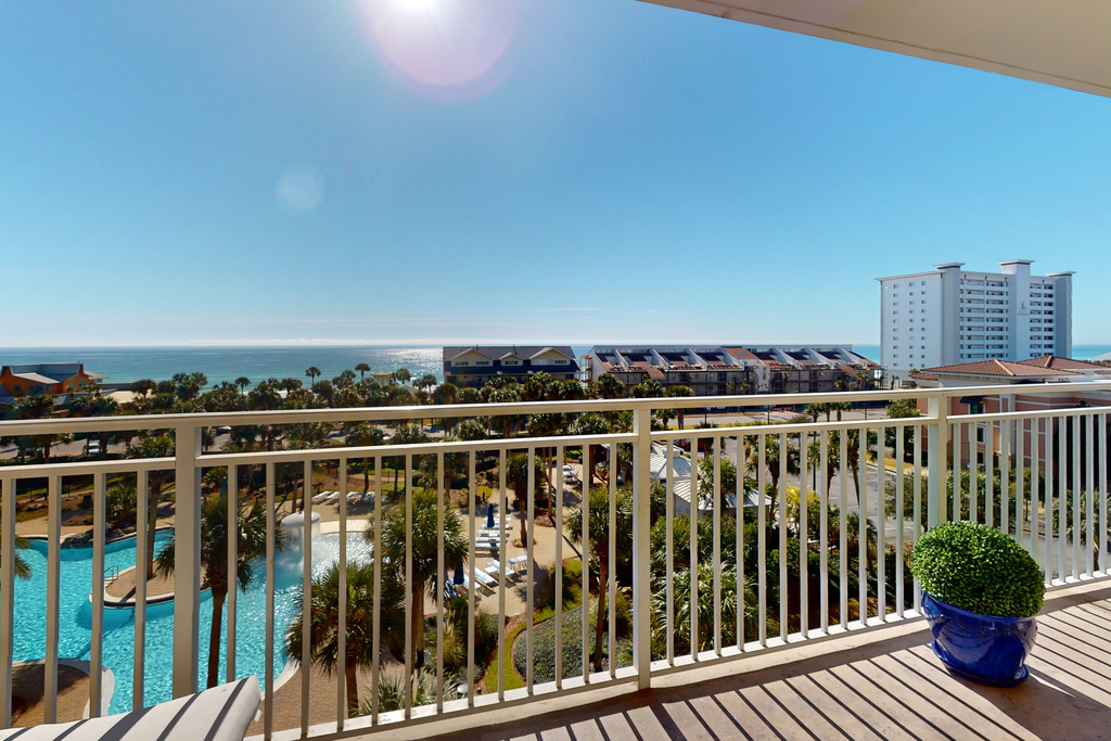 5th-floor condo with Gulf views, heated pool, gym, BBQ area, & private balcony