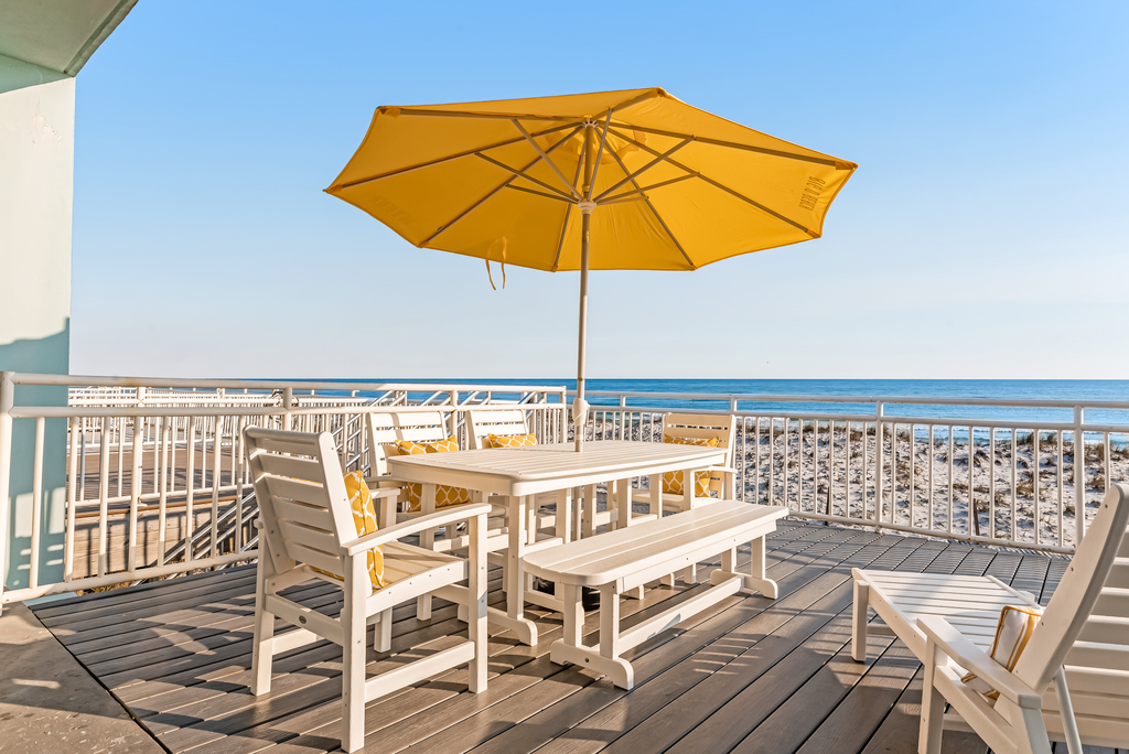 Dog-friendly, beachfront dream with a wet bar & two furnished balconies