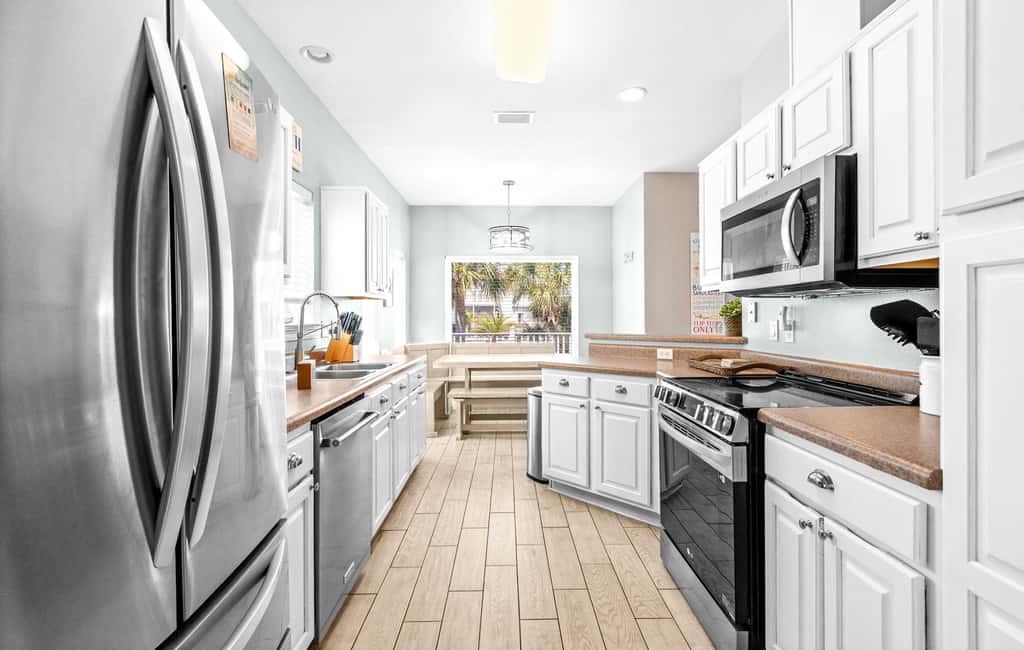 Stunning Beach Retreat with Shared Pool, Beach Access, Large Balcony & Gas Grill