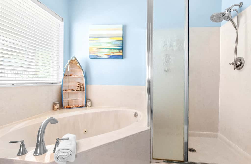 Stunning Beach Retreat with Shared Pool, Beach Access, Large Balcony & Gas Grill