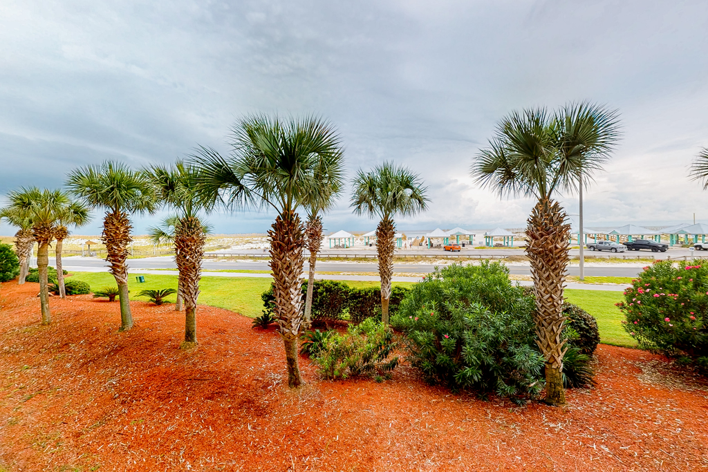 Beachfront condo with pool, Gulf-view balcony, central AC, & washer&dryer