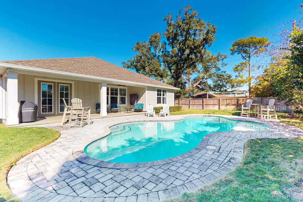 Contemporary dog-friendly retreat with pool & patio - near shops & attractions