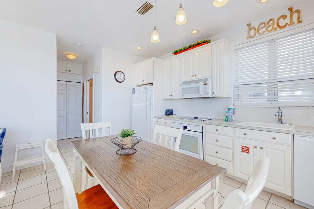 Beautiful lakefront condo with WiFi, beach views, & pool