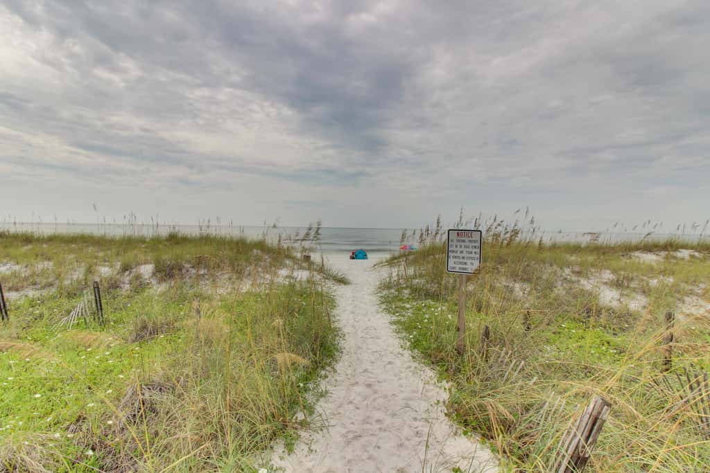 Beautiful lakefront condo with WiFi, beach views, & pool