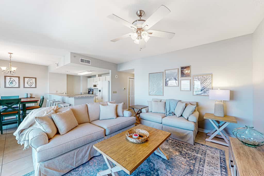 Sunlit & tropical beachfront condo with pool, gym, balcony views
