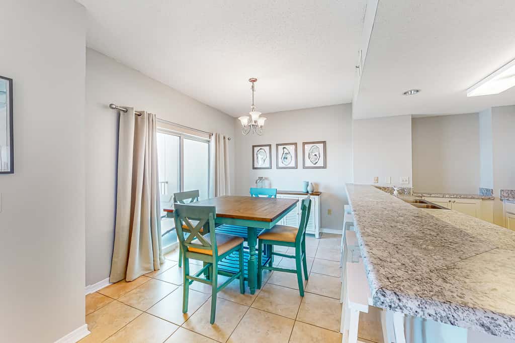 Sunlit & tropical beachfront condo with pool, gym, balcony views