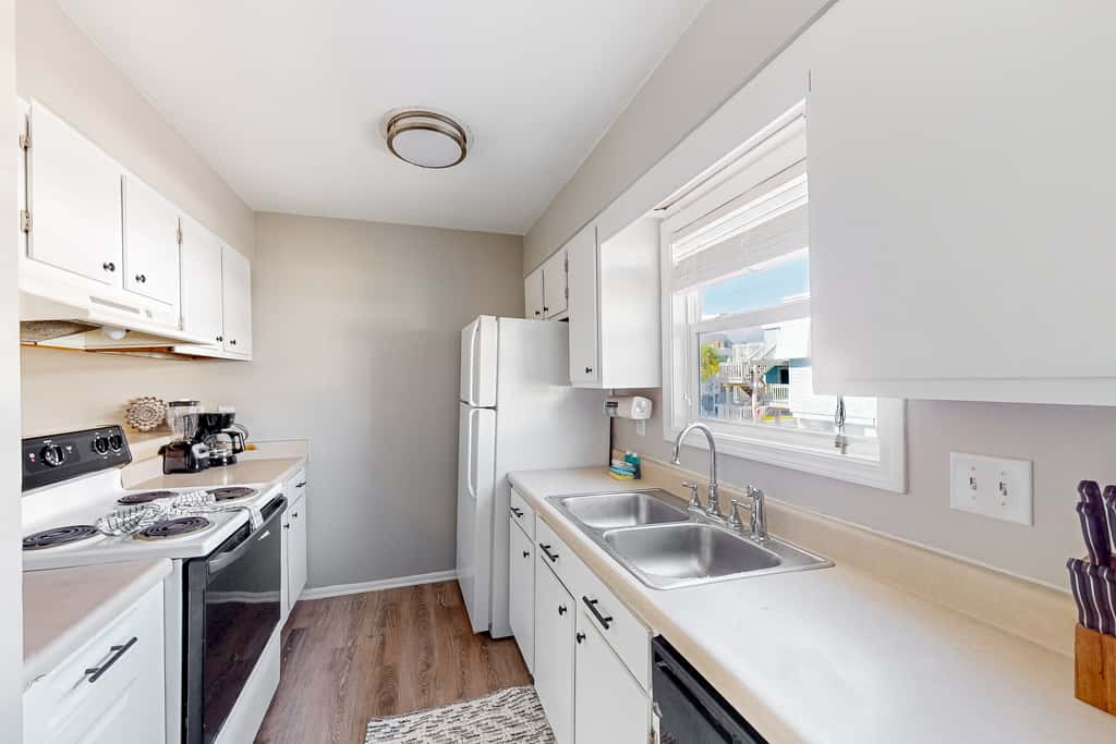 Sound-Side Condo with Grill, Deck, & W&D and Shared Pool