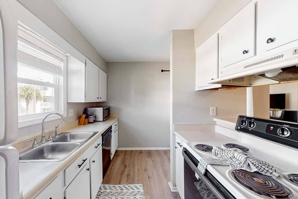 Sound-Side Condo with Grill, Deck, & W&D and Shared Pool