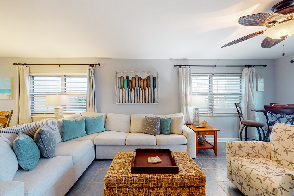 Oceanfront condo with shared pool & patio, open layout, W/D, & AC