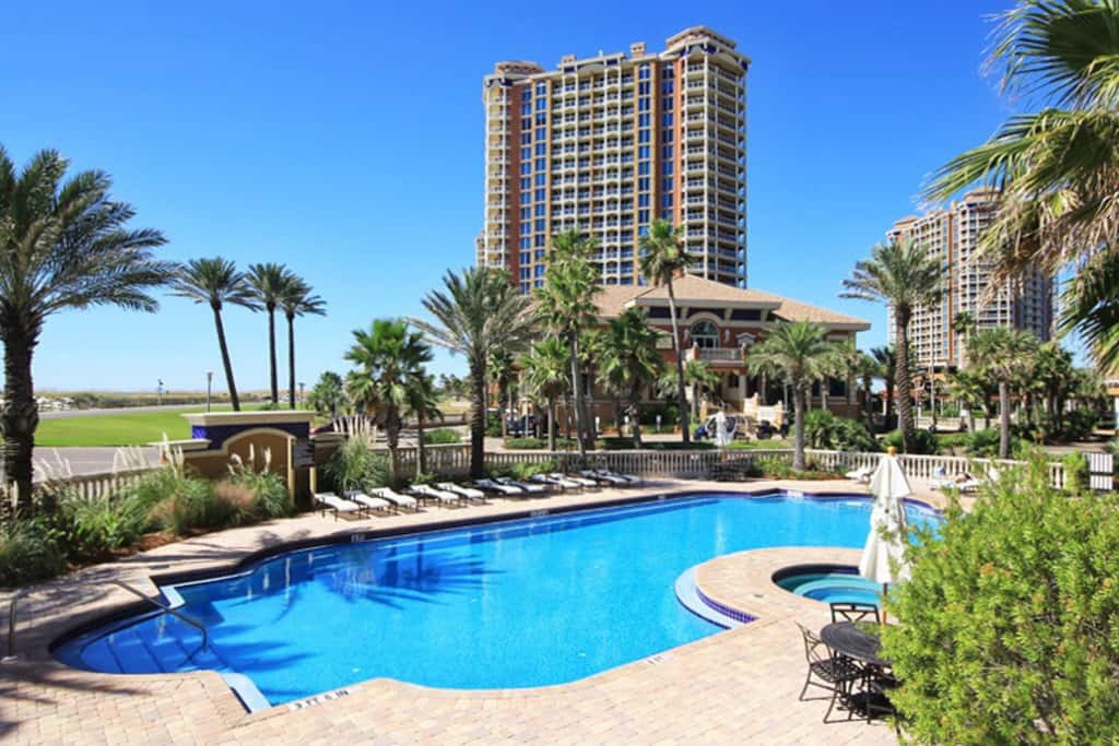 Gulf-view condo with pool, hot tub, beach access, tennis, balcony, AC, & W/D